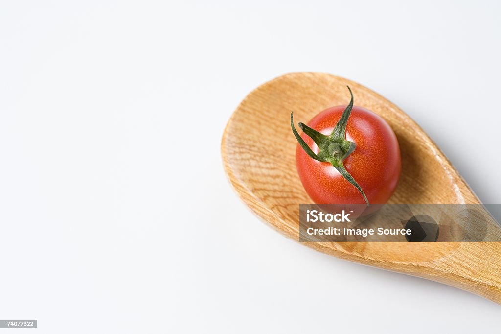 Tomaten auf einem hölzernen Löffel - Lizenzfrei Antioxidationsmittel Stock-Foto