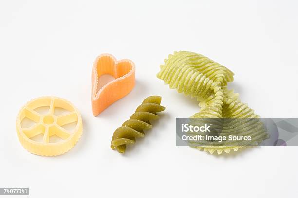 Different Shapes Of Pasta Stock Photo - Download Image Now - Four Objects, Pasta, Bow Tie Pasta