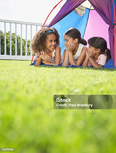 Three Girls In Tent Stock Photo - Download Image Now - 10-11 Years, 4-5 Years, Adventure