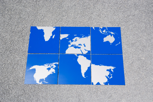 world map drawn in green pen on school paper globe. 3D illustration. Horizontal banner
