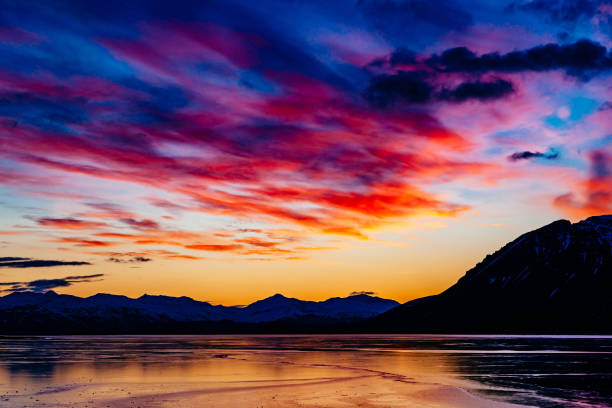 istock Scenic View Of Mountains Against Cloudy Sky 742394855