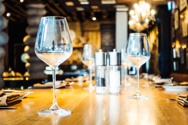 istock Close-Up Of Wine Bottles On Table 743741759