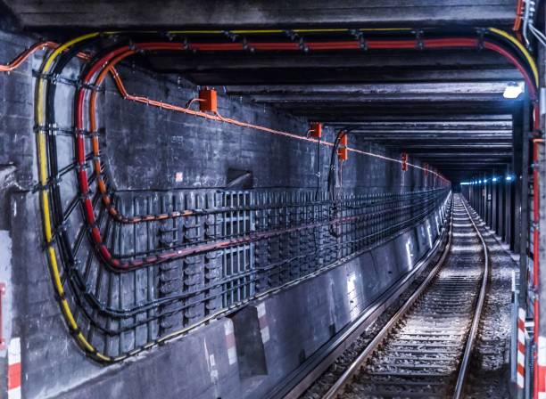 istock Railroad Track In Illuminated Tunnel 743748029