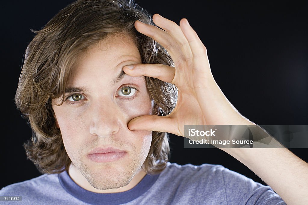 Man opening his eye  Open Stock Photo