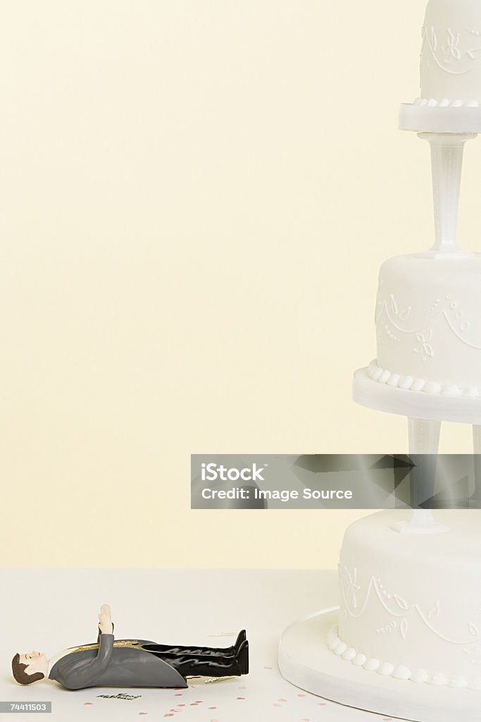Fallen bridegroom wedding cake  Wedding Cake Stock Photo