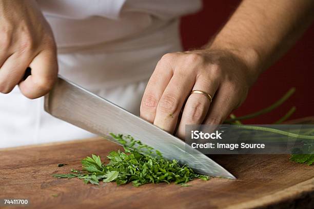 Chef Chopping Parsley Stock Photo - Download Image Now - Kitchen Knife, Chef, Cooking