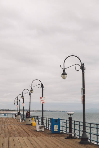istock Street Light By Sea Against Sky 750513525