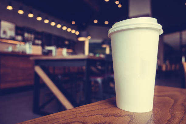 istock Close-Up Of Coffee Cup On Table 750561247