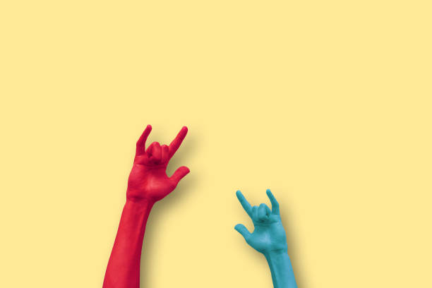 istock Close-Up Of Hands Against Colored Background 752176713