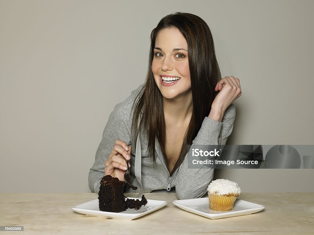 Young woman with cakes - Royalty-free Alimentação Não-saudável Foto de stock