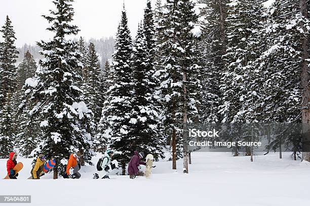 Snowboarders Stock Photo - Download Image Now - Adult, Adults Only, Carrying