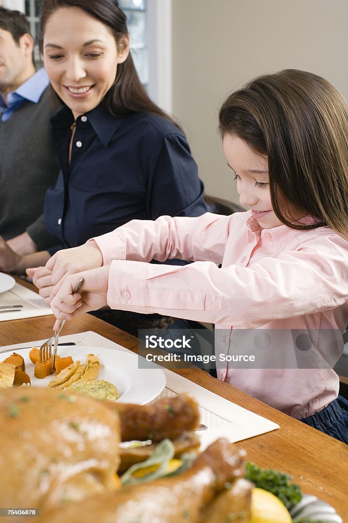 Girl eating thanksgiving dinner - Royalty-free Dia de Ação de Graças Foto de stock