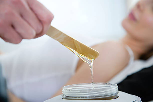 Hot wax treatment  waxing stock pictures, royalty-free photos & images