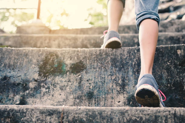 istock Low Section Of Girl Walking On Steps 755741713