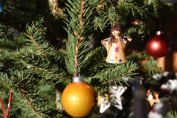 istock Close-Up Of Decorations Hanging On Christmas Tree 755763627