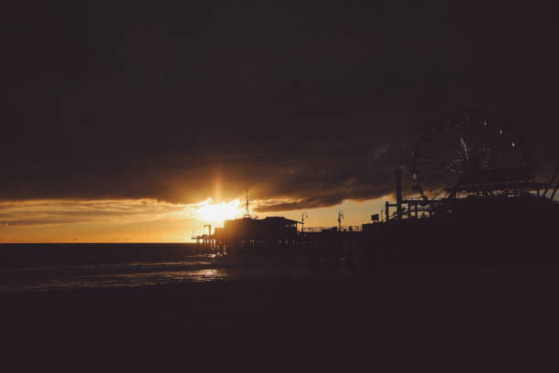 istock Silhouette Santa Monica Pier At Beach Against Cloudy Sky During Sunset 758482859