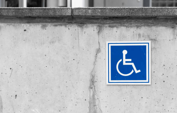 istock Wheelchair Sign On Wall 758527645