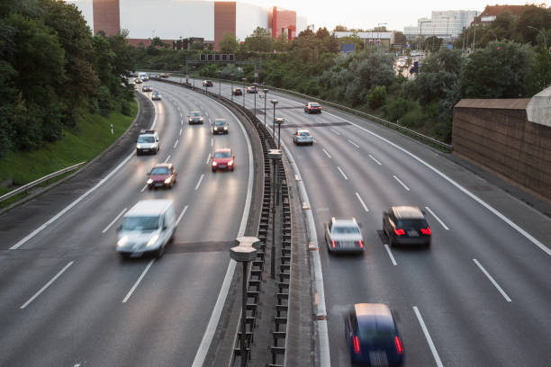 istock High Angle Blurred Motion Of Vehicles Moving On Highway 758531971