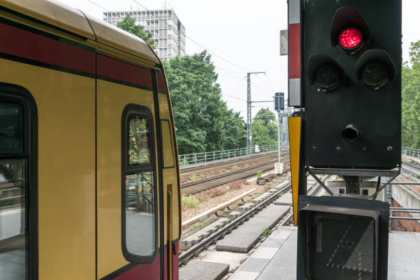 istock Train By Illuminated Railway Signal On Railroad Station Platform 758536767