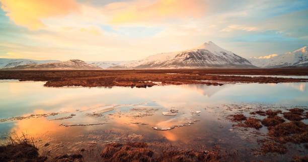 istock Scenic View Of Lake Against Cloudy Sky 758627405