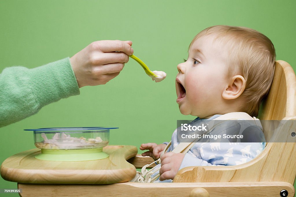 Adult feeding baby - 로열티 프리 아기 스톡 사진