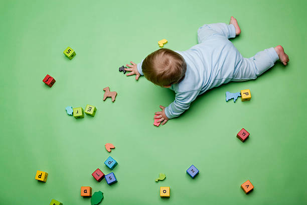 baby with building blocks - block child play toy стоковые фото и изображения