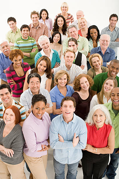 Large group of people  large group of people facing camera stock pictures, royalty-free photos & images