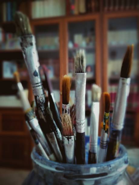 istock Close-Up Of Various Paintbrushes In Jar 760247245