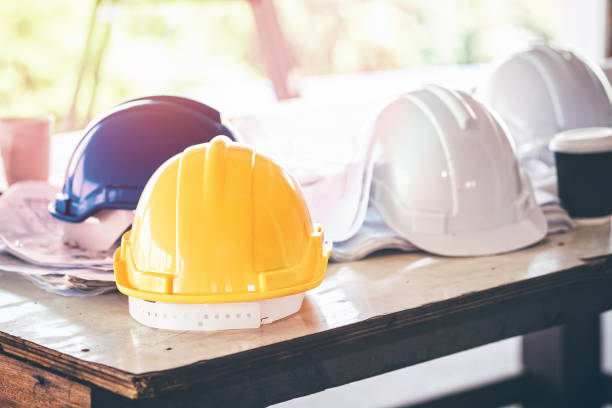 istock Close-Up Of Hardhats On Table 763241937