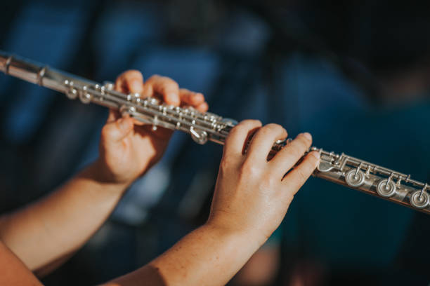 istock Close-Up Of Hands Playing The Flute 763250219