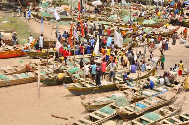 istock High Angle View Of People Standing On Boats At Beach 763266743