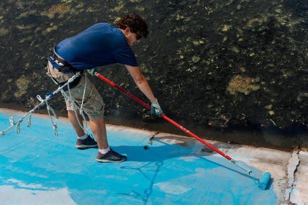 istock High Angle View Of Man Painting Wall 763272429