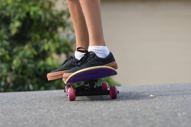 istock Low Section Of Boy On Skateboard 763276437