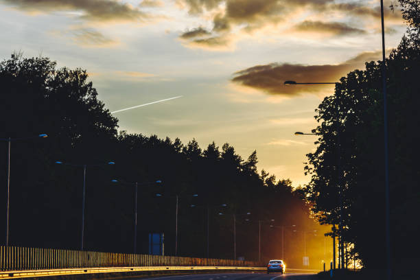 istock Cars On Road Against Sky During Sunset 764886519