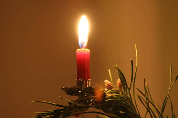 istock Close-Up Of Illuminated Candle On Christmas Tree 766401777
