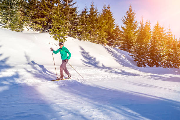 istock Woman Snowboarding During Sunny Day 768019495