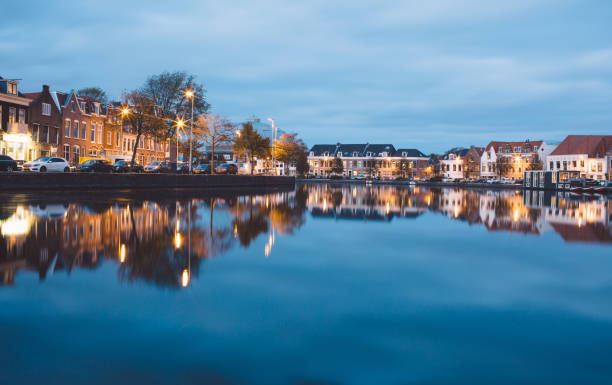 istock Reflection Of Buildings In Water 768093375