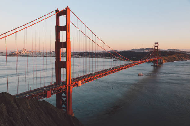 istock Suspension Bridge Over River Against Sky 768099279
