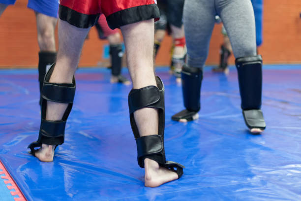 istock Low Section Of People Standing On Sports Mat 769774443