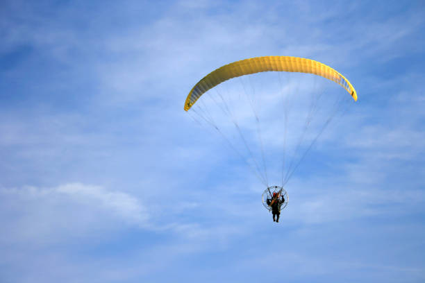 istock Low Angle View Of Person Paragliding Against Sky 769775167