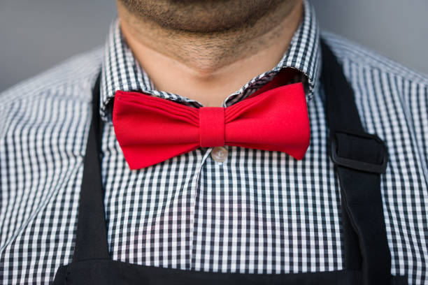 istock Close-Up Of Man Wearing Red Bow 769802553