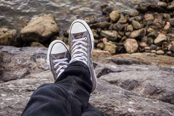 istock Low Section Of Man Resting On Rock 769818387