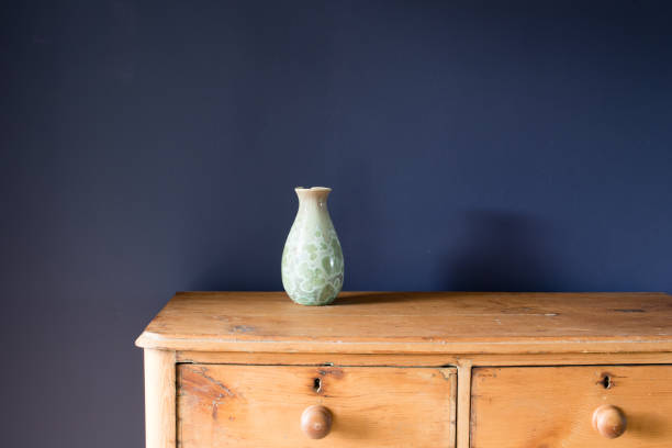 istock Close-Up Of Vase On Wooden Table 771496427