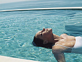 A woman relaxing in the water