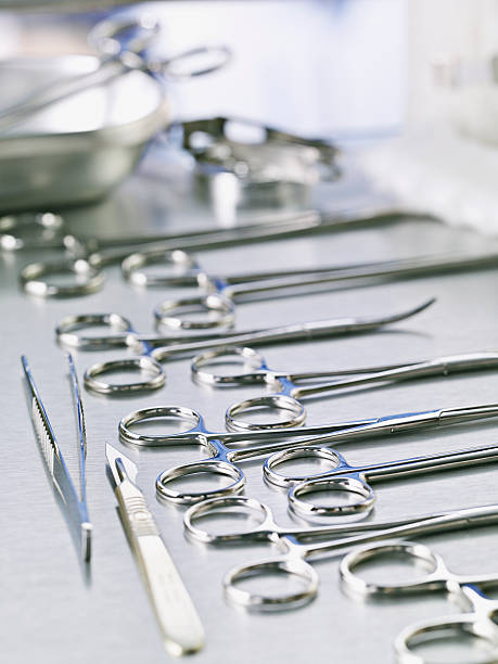 Medical scissors and scalpel on table  forceps stock pictures, royalty-free photos & images