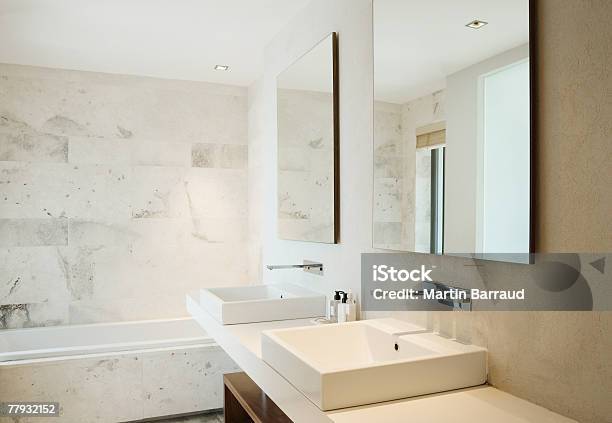 Modern Bathroom Vanity And Bathtub Stock Photo - Download Image Now - Bathroom, Vanity Mirror, Bathroom Sink