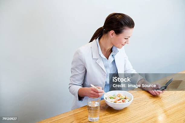 Young Woman With Lunch And Cellphone Stock Photo - Download Image Now - Adult, Adults Only, Bowl