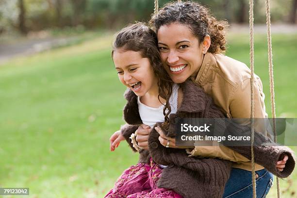 Mother And Daughter On Swing Stock Photo - Download Image Now - Family, Latin American and Hispanic Ethnicity, Mother