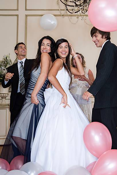 Mother and daughter dancing at quinceanera  quinceanera stock pictures, royalty-free photos & images