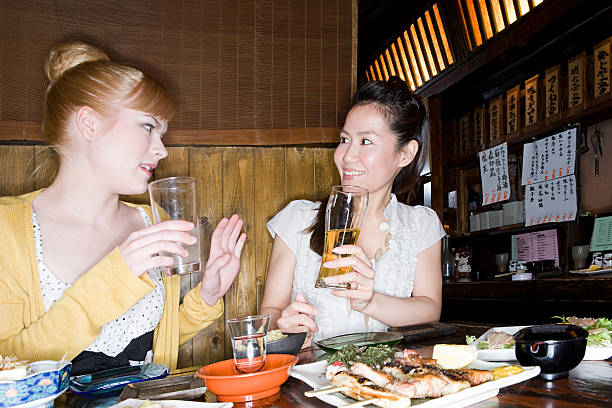 amici parlando in un bar - glasses women smiling human face foto e immagini stock